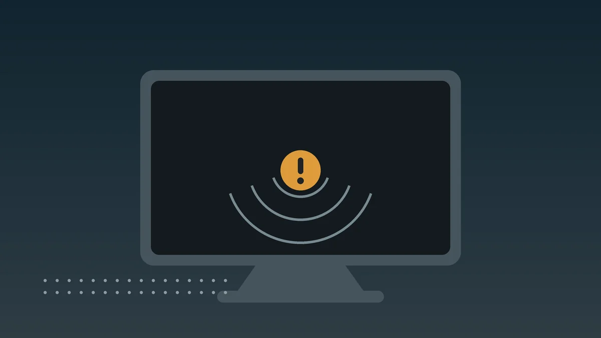 Monitor cinza com a tela escura, ondas concêntricas ao redor e um círculo âmbar com ponto de exclamação no centro